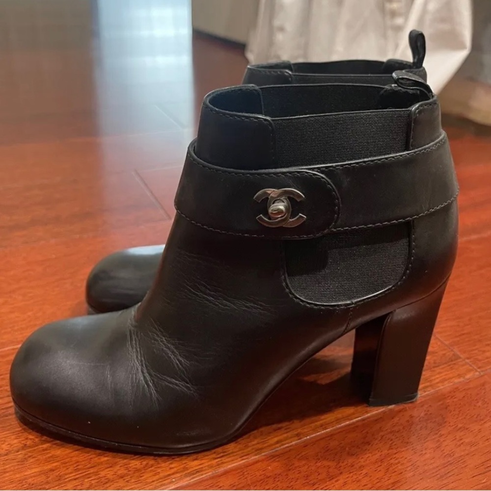 Chanel Black Booties size 36 with silver hardware. In very good used condition!